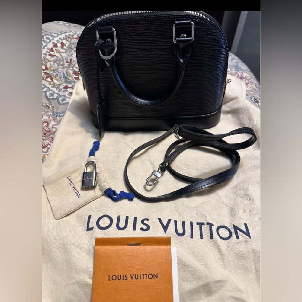 NO LONGER FOR SALE 

LOUIS VUITTON ALMA EPI BB FOR SALE - EXCELLENT CONDITION!